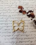 BUTTERFLY BEZEL